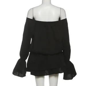 Detailed back view of a black off-shoulder dress with elegant flare sleeves on a mannequin.