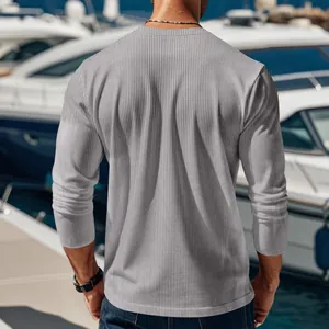 Detail view showing the back and ribbed texture of a gray long-sleeved top for men