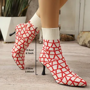 Detail view of red geometric pattern sock boots with 7.5cm stiletto heel measurements.