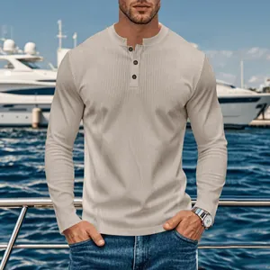 Detail shot of men's beige ribbed Henley long-sleeved shirt for outdoor leisure