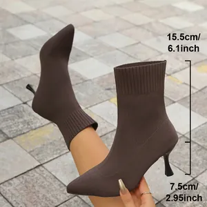 Detail of brown pointed toe stiletto sock boots with 7.5cm heel and 15.5cm shaft