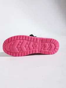 Detailed view of pink textured non-slip rubber sole for women's casual flat shoes