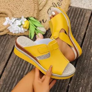 Stylish yellow Roman wedge slides with peep-toe design for beach and summer wear
