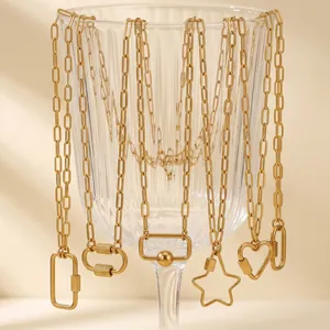 Close-up detail of gold-plated paperclip necklaces with multiple geometric charm styles
