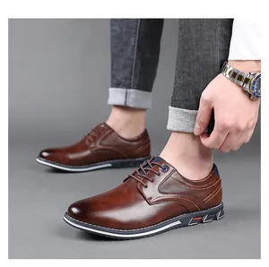 Detailed side view of stylish men's brown leather business casual shoes with laces