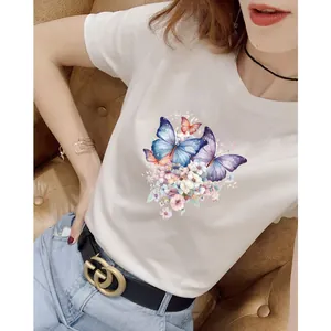 Detailed view of colorful butterfly watercolor heat transfer on a white cotton T-shirt