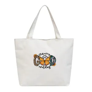 White canvas tote bag featuring a Choosing GOD everyday butterfly heat transfer sticker