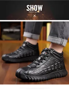 Close-up detail of premium black crocodile-textured high-top leather winter boots