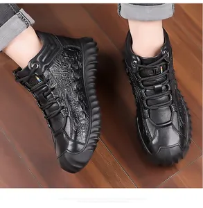 Close-up of black high-top men's winter shoes with crocodile embossed leather