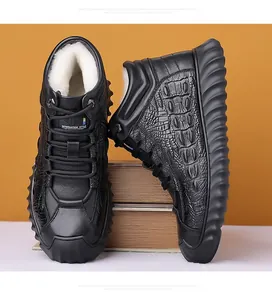 Close-up detail of men's winter high-top cowhide leather boots with warm wool lining