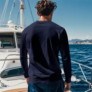 Back view detail of a navy blue ribbed corduroy long-sleeve shirt in a lifestyle setting