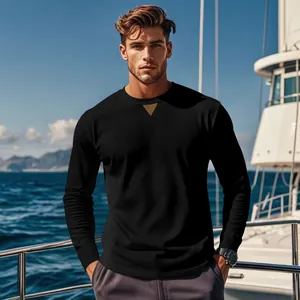 Detail view of men's black ribbed corduroy top with triangle patch at neck