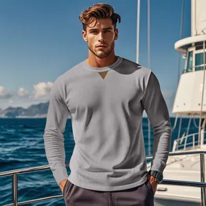 Men's premium gray ribbed corduroy long-sleeve sweatshirt with V-patch on a yacht