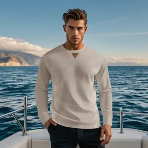 Detailed view of men's casual corduroy long sleeve top in light beige on a yacht