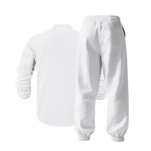 Back view of mens white loose linen casual Henry shirt and matching trousers set