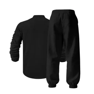 Back view of men's loose black linen leisure set with long sleeve shirt and pants