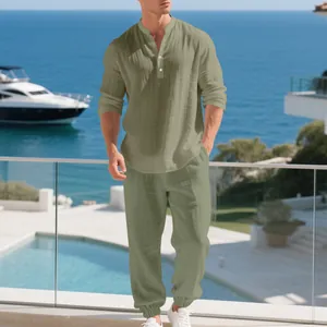 Men's sage green linen long sleeve henley shirt and matching loose vacation pants set