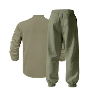 Back view detail of men's loose olive green linen henley shirt and joggers two-piece set