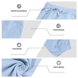 Detail view of waistband, pockets, and linen fabric texture for casual blue pants set