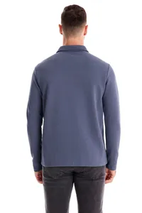 Back view of a classic men's blue long-sleeved polo shirt made from breathable cotton fabric.