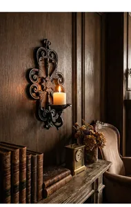 Vintage European wrought iron wall candle holder in a classic interior setting