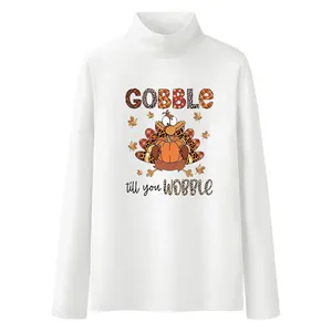 Haut blanc à col montant et manches longues avec motif de dindon de Thanksgiving