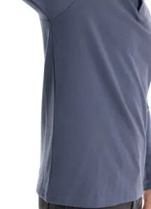 Side view detail of men's grey-blue long-sleeve polo shirt showing cotton texture