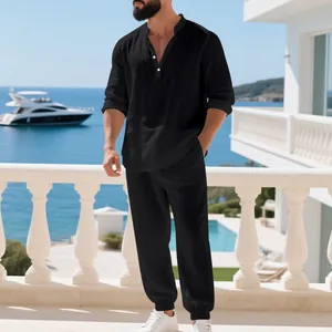 Stylish men's loose black linen Henley long sleeve shirt and matching pants vacation set