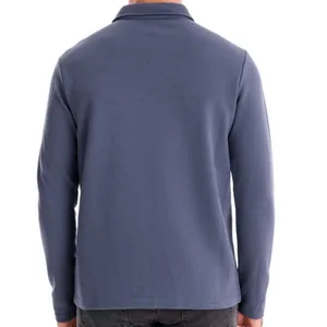 High-quality men's long-sleeved polo shirt in dusty blue washed cotton, back view