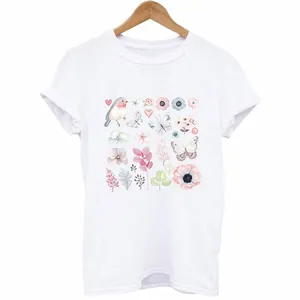 White T-shirt featuring elegant pastel floral, bird and butterfly heat transfer print.