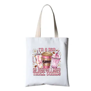 White canvas tote bag with funny 'I'm a Mom Three Drinks' coffee graphic print design