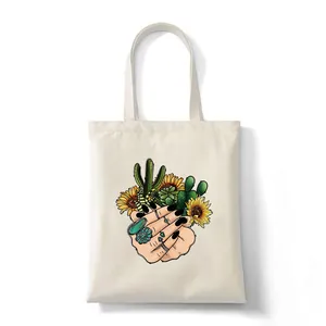 Eco-friendly canvas tote bag with artistic sunflower and cactus graphic print
