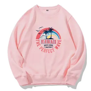 Classic pink crewneck sweatshirt featuring a vintage Hawaii North Shore surf club graphic