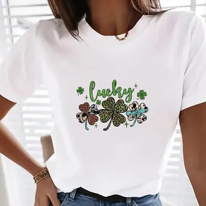 Close-up detail of St. Patrick's Day Lucky shamrock iron-on heat transfer on a white tee