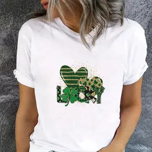 Detailed view of St. Patrick's Day heat transfer sticker with LUCKY and shamrock hearts.