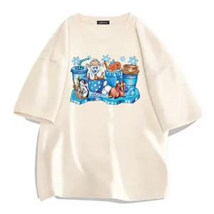 Detail view of the colorful winter-themed heat transfer print on a beige T-shirt
