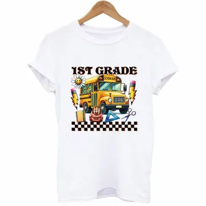 White casual t-shirt featuring a colorful 1ST GRADE school bus heat transfer print design