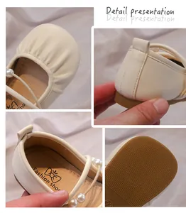 Detalles de zapatos de princesa para niña en color crema con perlas y pliegues.