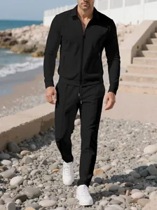 Men's black waffle texture tracksuit set featuring zip-up jacket and matching pants