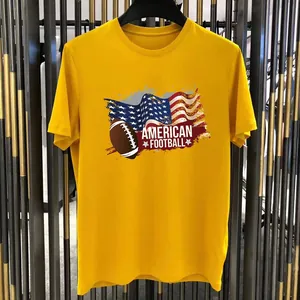 Camiseta de algodón amarillo para hombre con estampado gráfico de fútbol americano y bandera USA