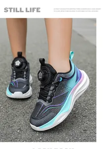 Close-up detail of boys' breathable mesh running shoes with rotating buckle design