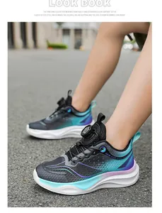 Close-up view of breathable mesh boys' running sneakers with teal and purple gradients.
