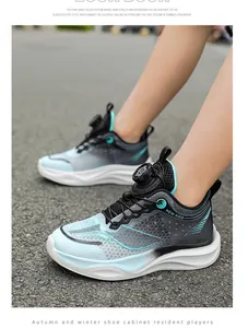 Outdoor view of breathable blue boys sneakers with rotary dial lacing system.