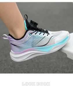 Close-up of breathable mesh boys sneakers with gradient design and rotary buckle system