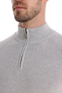 Close-up detail of a grey men's half-zip knitted sweater with stand collar