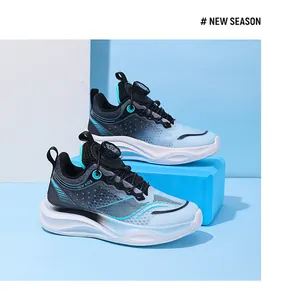 Side view of boys breathable mesh running shoes with convenient rotary dial lacing system