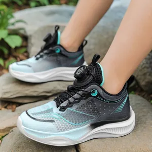 Breathable boys running shoes featuring a blue gradient mesh and rotating buckle laces.