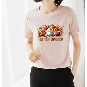 Women's pink T-shirt with Tis the Season autumn pumpkin and football print