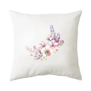 Detailed view of elegant watercolor floral print on a white square throw pillow case