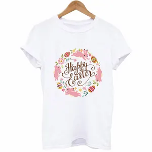 White t-shirt with Happy Easter bunny and floral wreath print on a wooden hanger